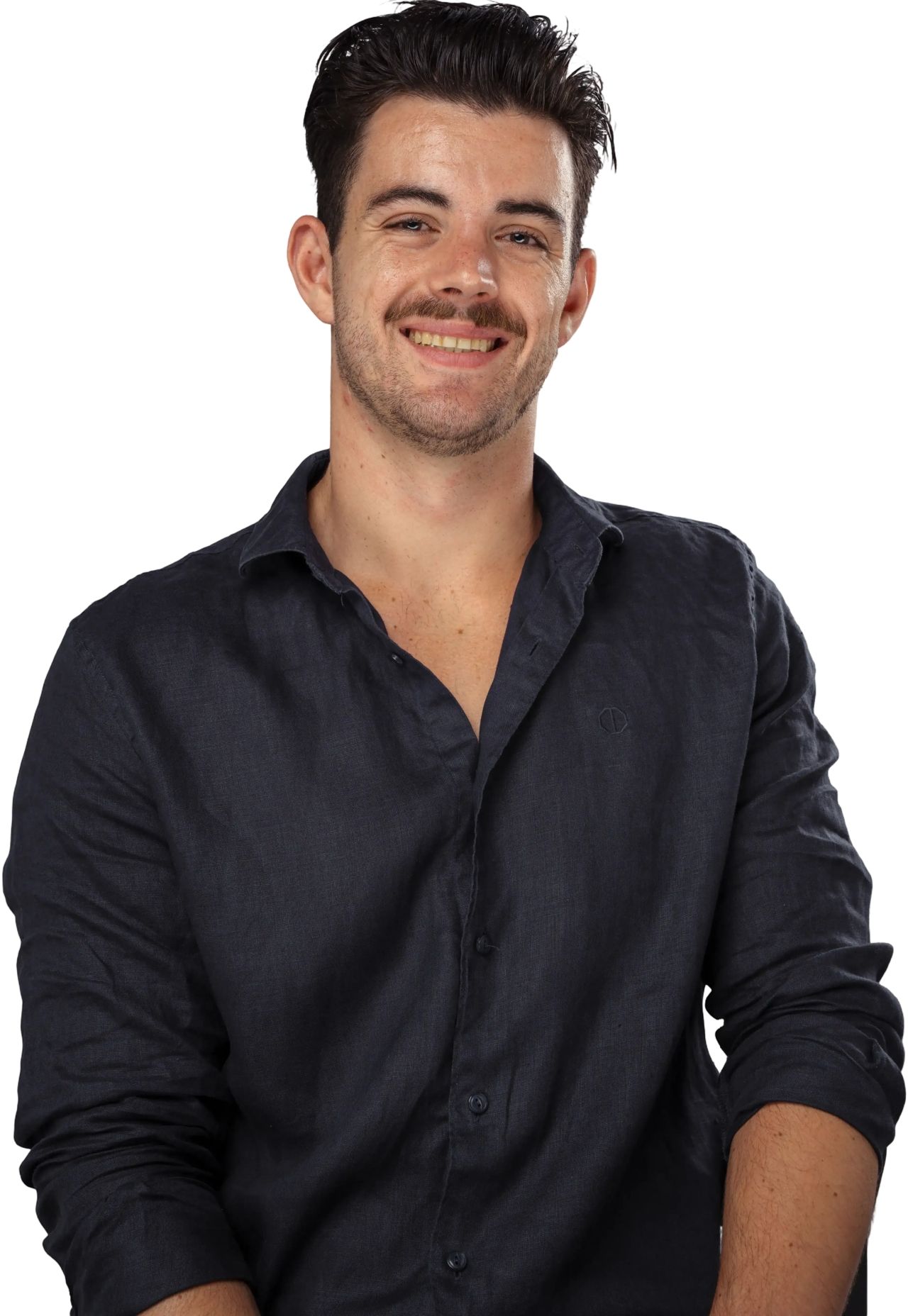 Johr lacht naar de camera