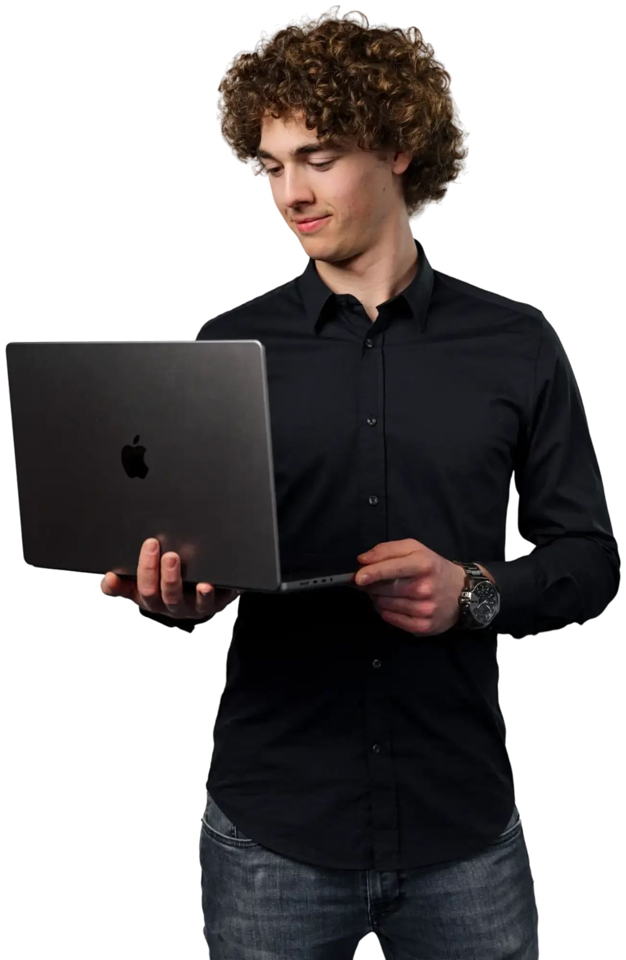 Joris Verberne kijkt naar de macbook die hij vast heeft